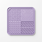 Square silicone dog lick mat on a white background showing its four textured sections