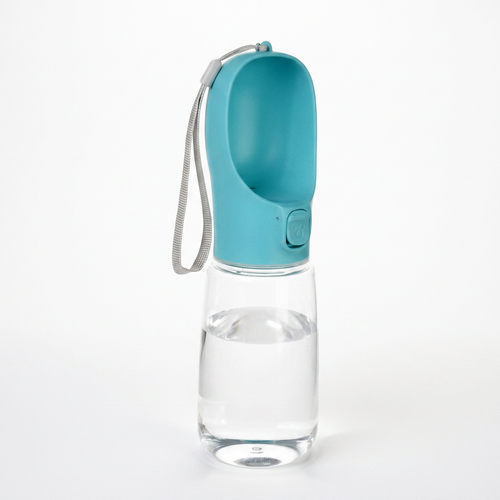 Portable dog water bottle on a white background with the drinking trough folded out