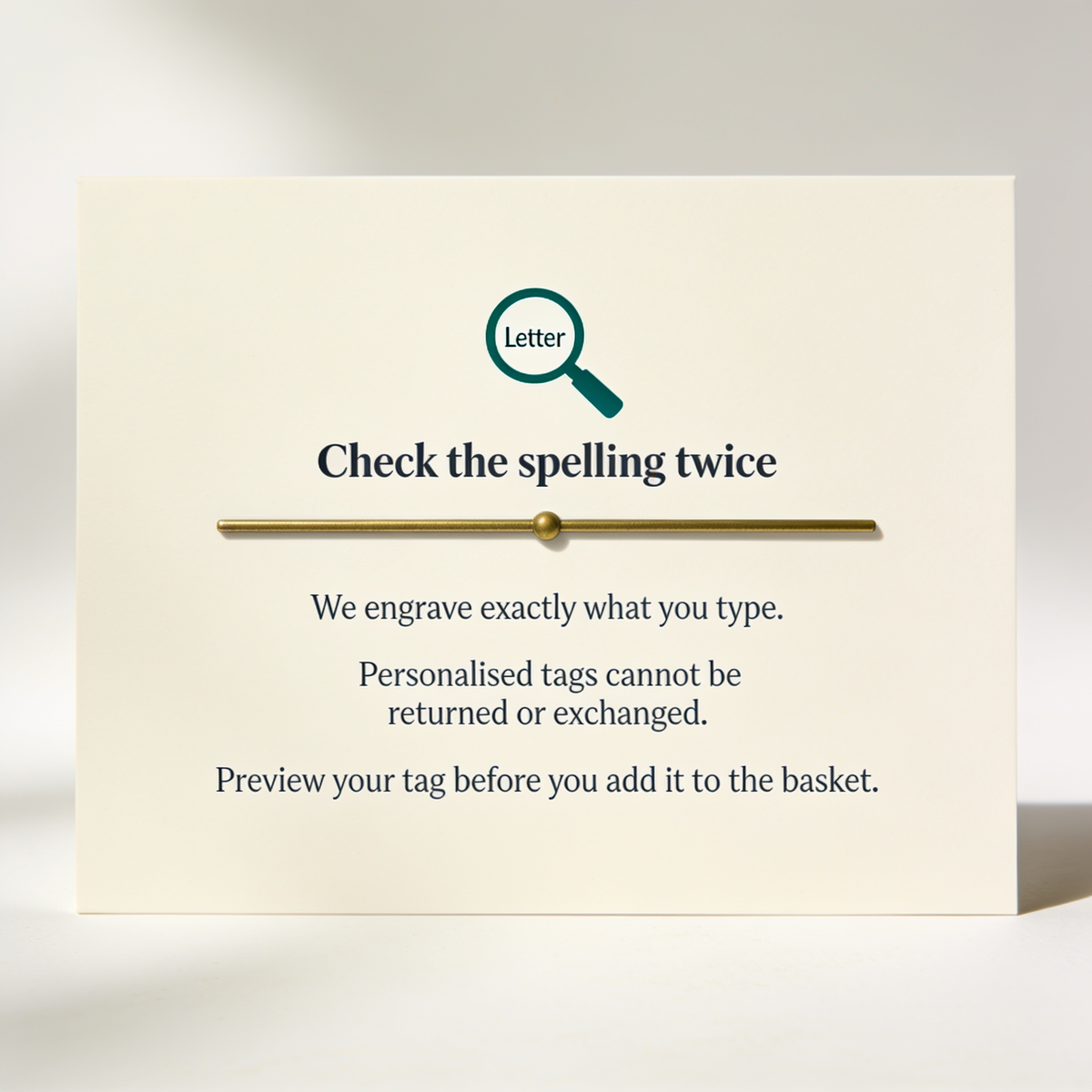 Warning card: engraved tags are made to order and cannot be returned, so check the spelling before you pay